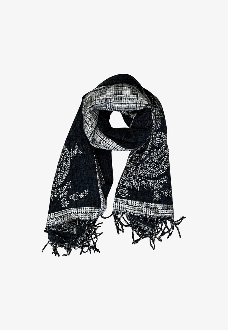Sciarpa bianca e nera realizzata in tessuto testurizzato, con un motivo paisley e bordi frangiati, e un design a scacchi lungo la parte superiore.