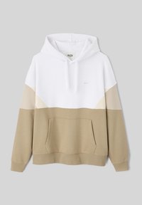 Hoodie présentant un haut blanc et un bas beige, avec une poche kangourou et un capuchon avec cordon. Fabriqué en tissu doux et texturé.