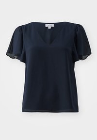 Blouse bleu marine à col en V en tissu léger, avec des manches courtes bouffantes et une coupe décontractée au toucher lisse.