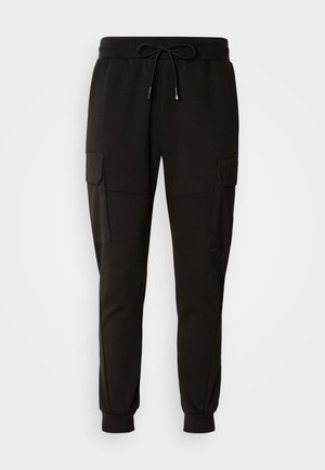 Black sweatpants with an elastic waistband and drawstring. Features cargo pockets on the sides and elastic cuffs at the ankles.