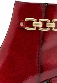 Marco Tozzi Bottines de cowboy / motard - dk red pat