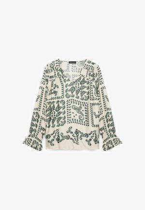 Blusa crema con motivi paisley e floreali verdi decorati, scollo a V, maniche lunghe e polsini arricciati.