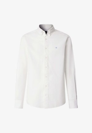 Bijela košulja dugih rukava s kopčanjem gumbima, ovratnikom s gumbima i malim plavim preklopljenim veslima kao logotipom na lijevoj strani prsa.