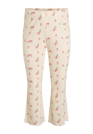 Kremno obarvane kratke hlače z rebrasto teksturo, z majhnim rožnatim cvetličnim tiskom in rahlim zvonastim robom.