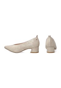 Beige suede block-heeled pumps with a pointed toe, textured surface, and subtle branding detail on the heel.