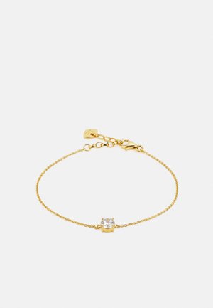 Pulsera de cadena de oro con un brillante de cristal transparente en el centro, colocado en un engaste de cuatro garras, con un cierre de langosta y longitud ajustable.
