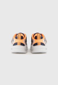 Navy and orange toddler sneakers with white soles shown from the back, set against a plain white background.