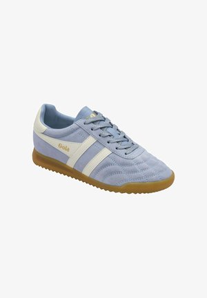 Light blue suede sneaker with white side stripes, gum sole, and "Gola" logo on the side and tongue, featuring laces and quilted toe design.