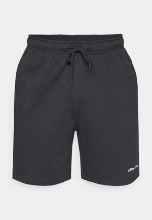 Tamsiai pilki sportiniai šortai, pagaminti iš švelnios medžiagos, su elastingu juosmeniu ir raišteliu, taip pat su mažuoju logotipu apatiniame šone.