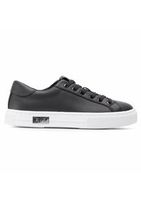 Black leather sneaker with white rubber sole, round toe, lace-up front, and a silver logo detail on the side. Smooth finish.