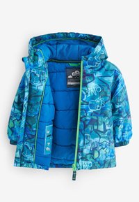 Veste de pluie pour enfants, rembourrée, de couleur bleue, avec des motifs de dinosaures et d'étoiles, une fermeture éclair verte, une capuche et des poignets élastiqués, présentée ouverte pour révéler l'intérieur.