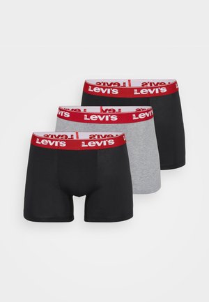 Három pár boxer alsónadrág: egy fekete, egy szürke, egy fekete. Piros elasztikus derékpánttal, amelyen a "Levi's" logó található. Puha, rugalmas anyag.