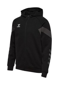 Sweat à capuche noir zippé intégral avec des accents chevron gris sur les manches, poches avant et logo blanc hummel sur la poitrine, présenté sur fond blanc.