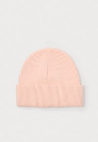 Pink ribbed beanie hat with a folded cuff, featuring a soft texture and a simple, rounded top design.
