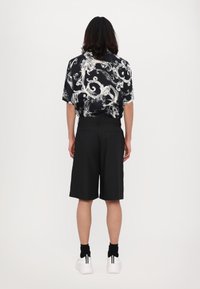 Versace Jeans Couture TECHNICAL TAILORING - Shorts - black