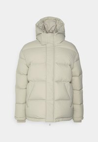 Ljusbeige puffjacka med hög krage och dragsko i huvan. Har två stora framfickor och dragkedja, tillverkad av ett slätt material.