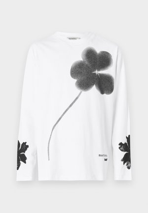 White long-sleeve t-shirt made of cotton, featuring a large black floral print on the front and smaller black flowers on the cuffs.