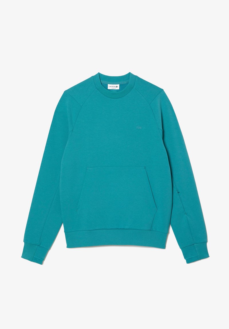 Sudadera en color verde azulado fabricada con un tejido suave, con cuello redondo, mangas raglán y un bolsillo canguro en el frente. Detalle de logo minimalista en el pecho.