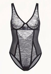 Svart bodysuit med spetsöverdrag med blommönster, genomskinliga meshsidor och en strukturerad bodice. Justerbara remmar och tryckknappsstängning.