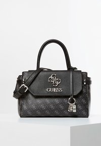 Sorte håndtaske med et struktureret design, der har en tekstureret overflade, aftagelig skulderrem og sølvfarvede logo detaljer på forsiden.