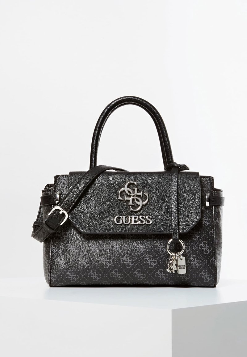 Sorte håndtaske med et struktureret design, der har en tekstureret overflade, aftagelig skulderrem og sølvfarvede logo detaljer på forsiden.