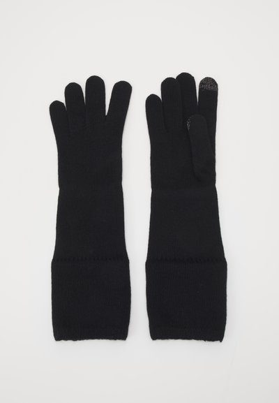Gants en tricot noirs avec un long poignet, dotés de cinq doigts et d'une texture sur le bout des doigts pour une utilisation avec écran tactile.