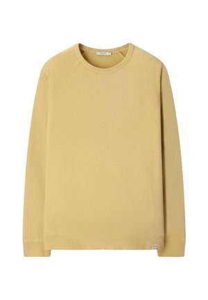 Sweat-shirt beige à manches longues avec col rond, poignets et ourlet côtelés, fabriqué en tissu lisse, sans motifs ni logos visibles.