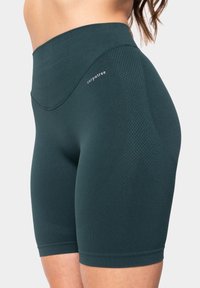 Hoge taille donkerblauwe shorts gemaakt van textuurstof met een gladde afwerking, met een subtiel ruitenpatroon en een merklogo.