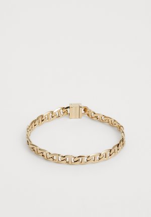 Gold metal chain bracelet with interlocking links and a clasp closure, featuring a smooth, polished finish and a simple, elegant design.