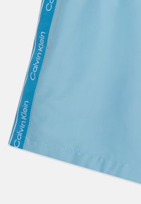 Calvin Klein Swimwear MEDIUM DRAWSTRING - Shorts da mare - pleasant blue