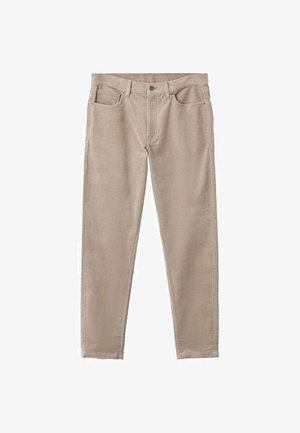 Beige corduroy-housut, joissa on slim fit -malli, viisi taskua, vetoketjullinen etuosa ja teksturoidumpinta.