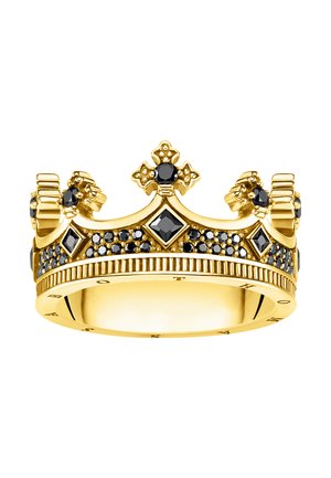Gold crown-shaped ring adorned with black gemstones in fleur-de-lis and diamond patterns, featuring engraved text on the inner band.