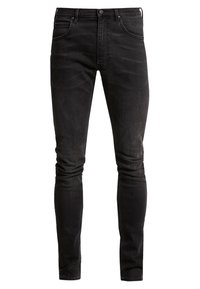 Vaqueros de mezclilla negra con un ajuste slim, que presentan un diseño clásico de cinco bolsillos, cierre de botón y un sutil desgaste para mayor textura.