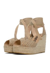 Sandali wedge espadrilles intrecciati beige con punta aperta, cinturini decorativi e suola in juta texturizzata. Dettagli in glitter sui cinturini.