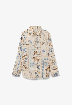 Langsleeve shirt gemaakt van crèmekleurige stof, met een blauw en bruin bloemenpatroon met vierkante accenten. Voorzien van een knoopsluiting en kraagdesign.