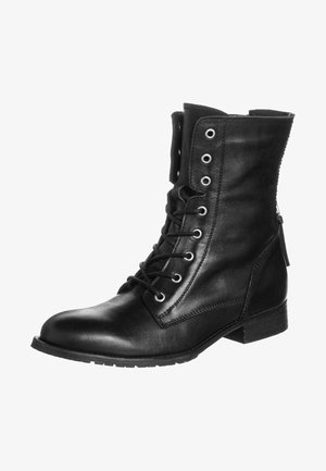 Black leather ankle boot with a rounded toe, lace-up front, metal eyelets, flat heel, and a side zipper for easy wear.