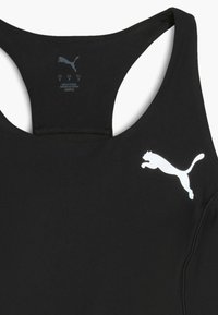 Must have musta spordirinnahoidja, mis on valmistatud elastsemast materjalist ja millel on ümar kaelus. Soodustab valget Puma logo ning sujuvat tekstuuri koos lameõmblustega.