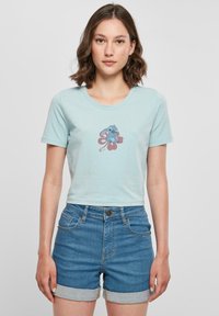 Merchcode LILO & STITCH SITTING ON FLOWER CROPPED - T-shirts med print - oceanblue