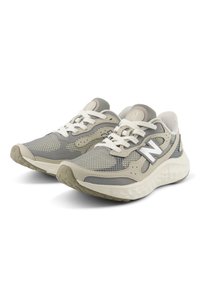 Men's sneakers featuring a breathable gray mesh upper, white accents, and rubber sole with a textured finish. Laced closure for secure fit.