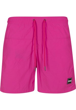 Korte badetrunks i lys pink nylon, med elastisk talje og snor, sidesømme og et lille mærke på kanten.
