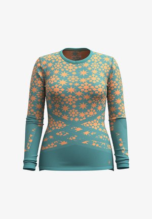 Long-sleeve top featuring a teal background with orange floral and geometric patterns, ribbed cuffs, and a rounded neckline.