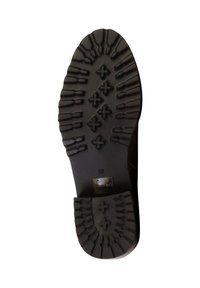 Suola di scarpa in gomma nera con battistrada a motivo. Presenta scanalature e rilievi per la presa. Taglia indicata come 38.