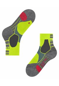 Calzini corti grigi con accenti verde brillante. Presentano un tallone rosso, aree imbottite in grigio e verde, e zone di usura rinforzate.