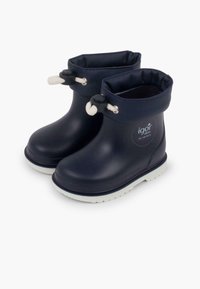 Botas de lluvia de goma en color navy con un diseño de puño, cordón ajustable y suela blanca. Textura suave, logo en el costado.