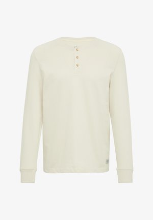 Langarm-Cremeshirt aus Baumwolle mit Rundhalsausschnitt, drei Knöpfen und gerippten Manschetten. Glatte Textur ohne Muster.