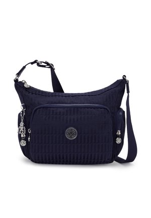Navy blue shoulder bag made of textured fabric with a zippered front pocket, logo detail, and adjustable strap. Features silver hardware accents.