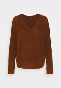 Pull marron tricoté avec col en V, manches longues et poignets côtelés. Texture douce et coupe décontractée, idéale pour une tenue casual.