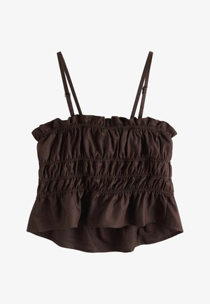 Pruun varrukateta lühike topp reguleeritavate spagetipõhiste rihmade ja kortsus, kogutud kangamustriga rinnaosa ja ääre kohal.