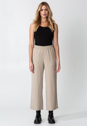 NELLA - Trousers - beige