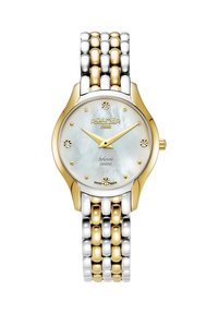 Reloj metálico en tono dorado y plateado con una esfera redonda de nácar, acentos de diamantes y una pulsera de eslabones. Presenta agujas de hora y minuto en dorado marcadas.